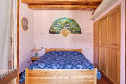 เตียงในห้องที่ In Valtellina da Valter e Lella