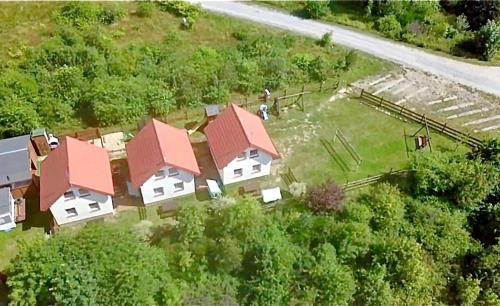 an aerial view of a house with red roofs at Domki Zagroda in Jastrzębia Góra