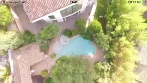 an aerial view of a house with a swimming pool at La Villa Saint Jean BAS DE VILLA in La Ciotat