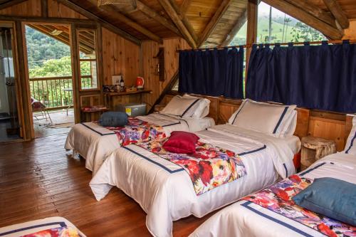 Cama o camas de una habitación en Palmas de Cocora