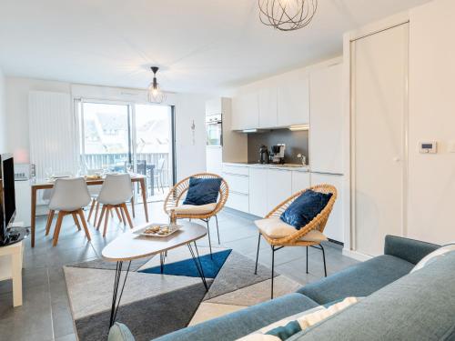 a living room with a couch and a table at Apartment Résidence Coté Baie by Interhome in Saint-Pierre-Quiberon