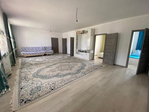 Ένα ή περισσότερα κρεβάτια σε δωμάτιο στο Guest House Arcabay-Karligash