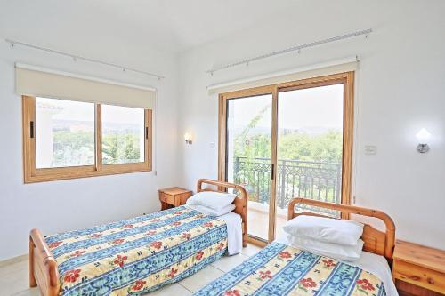 Katil atau katil-katil dalam bilik di Villa Athina Finiki