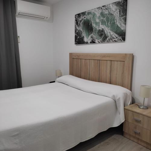 Cama o camas de una habitación en Hostal Castilla