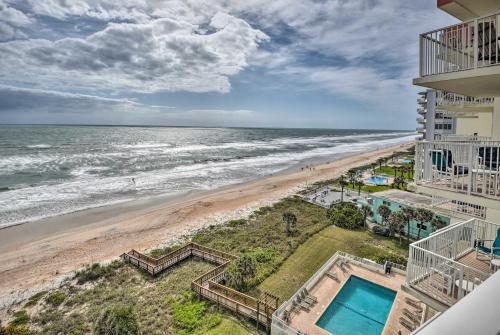 an aerial view of the beach and the ocean at Oceanfront Ormond Beach Condo - Steps to Shore! in Ormond Beach