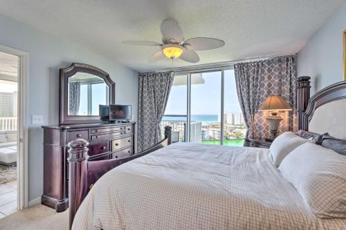 a bedroom with a bed and a large window at The Terrace at Pelican Beach Resort: View + Pool! in Destin