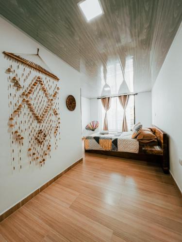 Hotel Pachamama Campestreにあるベッド