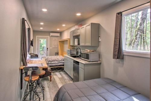 a small room with a kitchen and a bedroom at Steps to Foothills Trail Unique Carbonado Studio in Buckley