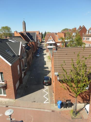 an aerial view of a street in a residential neighbourhood at Calici in Emden
