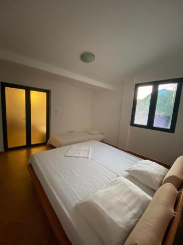 Postel nebo postele na pokoji v ubytování Villa Lutovac Budva