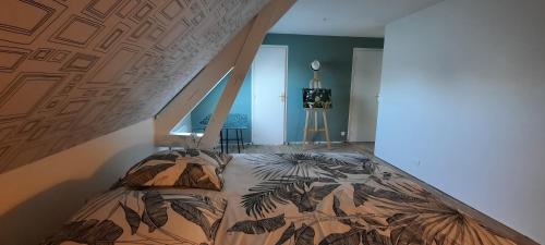 Postel nebo postele na pokoji v ubytování L'escale des caboteurs chambre d'hôte