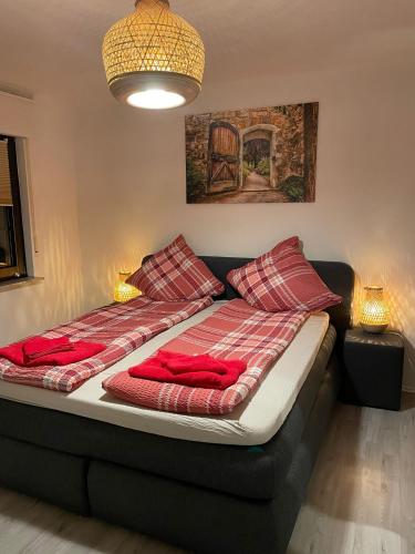 Posteľ alebo postele v izbe v ubytovaní Ferienhaus-Weitsicht