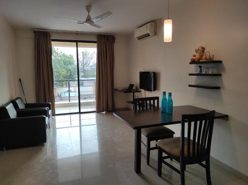 Gallery image of 1BHK AC Service Apartment 103 in Pune