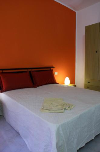 Una cama o camas en una habitación de B&B La Terrazza Sul Porto