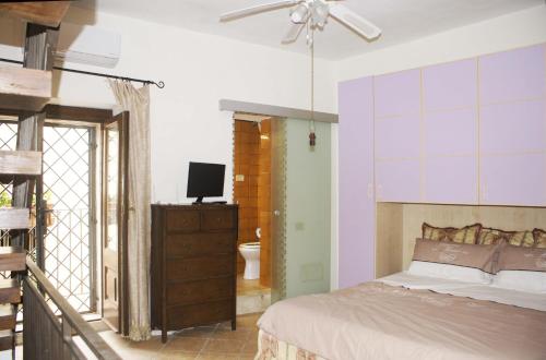 A bed or beds in a room at Ciuri Ciuri