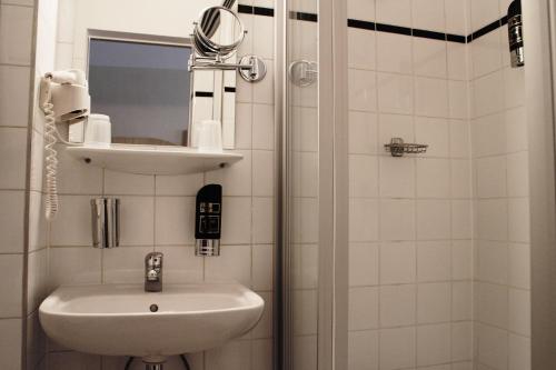 Ванная комната в Hotel Graf Stadion