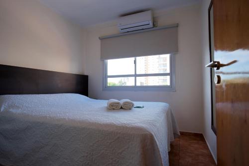 Postel nebo postele na pokoji v ubytování Regia Apartamentos Posadas