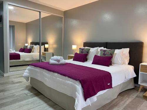 Gulta vai gultas numurā naktsmītnē Acqua Apartments Bariloche
