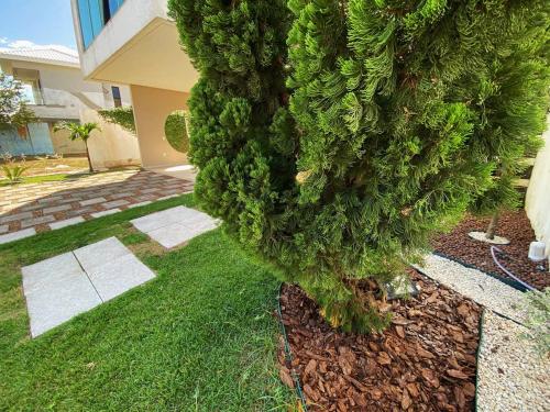 Κήπος έξω από το Duplex em Guarapari com piscina privativa!