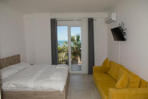 Postel nebo postele na pokoji v ubytování Soluna Apartments