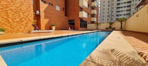 Kolam renang di atau dekat dengan The Belluno apartamento completo e aconchegante