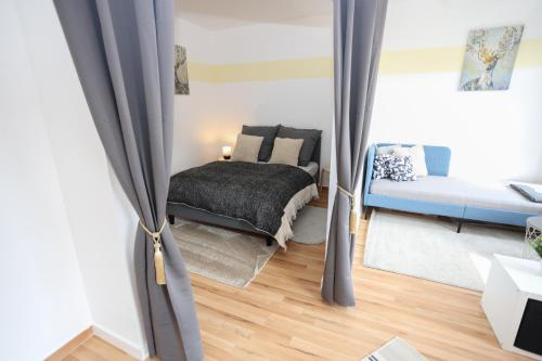 Postel nebo postele na pokoji v ubytování FullHouse - Chemnitz - M45 Apartments