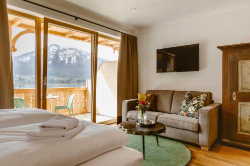 Postel nebo postele na pokoji v ubytování Seehotel Berau