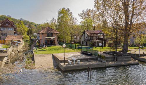 a group of animals sitting on a dock in the water at Dunavska Kuća in Smederevo