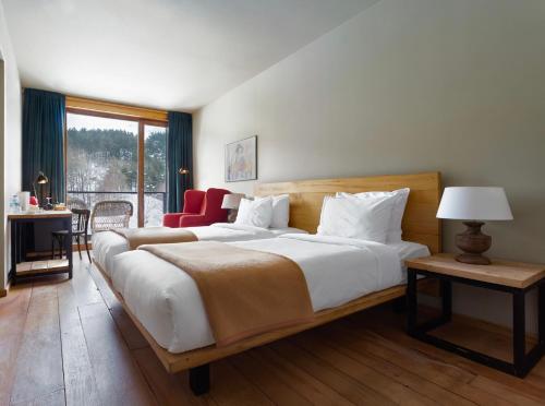 Voodi või voodid majutusasutuse Rooms Hotel Kazbegi toas