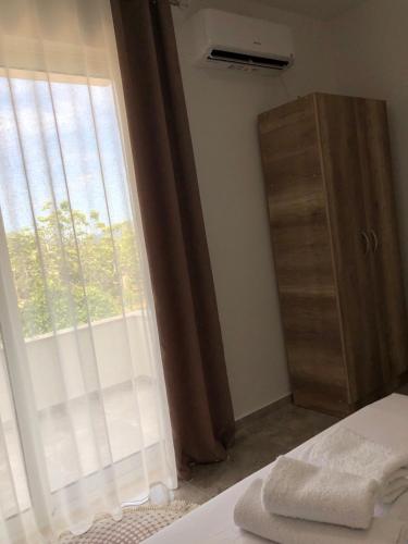 Apartments kupi ul rudaj 41にあるベッド