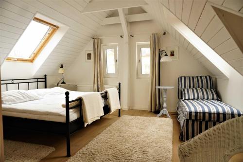 سرير أو أسرّة في غرفة في Refugium Erholung am Meer