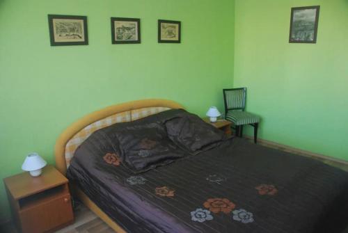 Postel nebo postele na pokoji v ubytování Bartakovics Apartman