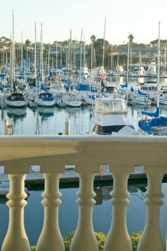 a view of a marina with boats in the water at Oceanside Marina Suites - A Waterfront Hotel in Oceanside