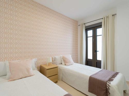 Postel nebo postele na pokoji v ubytování Mahostly Apartamento Comillas PA
