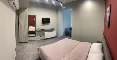 Ένα ή περισσότερα κρεβάτια σε δωμάτιο στο Red Cube Hotel