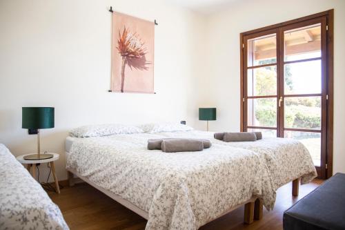 Llit o llits en una habitació de Residenza La Corte Visconti - flat with pool and patio