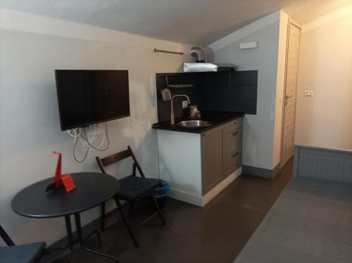 TV a/nebo společenská místnost v ubytování B&Big Prato