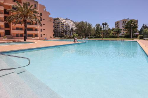 Apartamentos Paraiso Sol da Rocha - Free heated indoor Swimming pool - wifi, Air co. - by bedzy