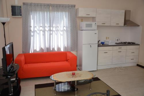 Η κουζίνα ή μικρή κουζίνα στο Wilhelmina Hotel & Apartments
