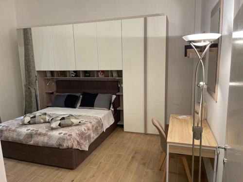 Cama o camas de una habitación en Nel quartiere Bayres Suite completamente rinnovata