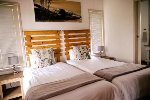 Ένα ή περισσότερα κρεβάτια σε δωμάτιο στο Monzi Safari Lodge