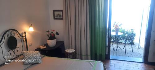 Katil atau katil-katil dalam bilik di Hotel La Giada del Mesco