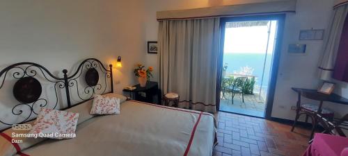 Katil atau katil-katil dalam bilik di Hotel La Giada del Mesco