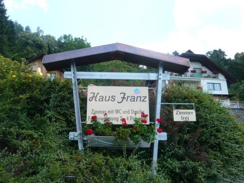 a sign that says blaks farm in front of a house at Haus Franz in Millstatt