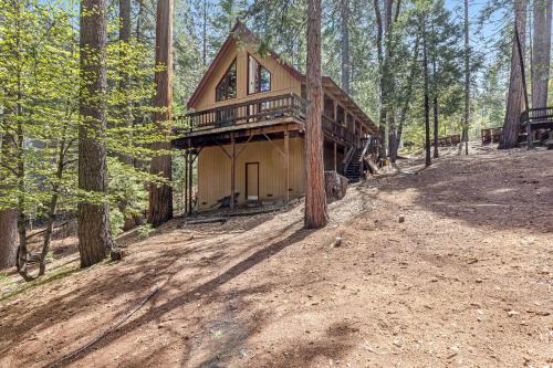 a house in the middle of a forest at Tranquility in the Woods in Arnold