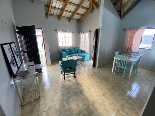 an aerial view of a living room with blue furniture at Oasis de paz 2 in Jarabacoa