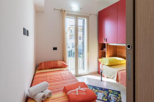 Giường trong phòng chung tại Villa Queen Dany