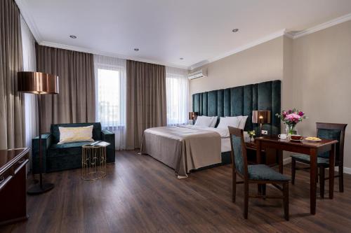 Postel nebo postele na pokoji v ubytování Greguar Hotel by UHM