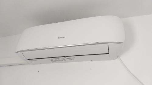 a close up of a white printer at C&B LOLA H4 - Habitación privada - Aire acondicionado - Baños compartidos in Puerto Real