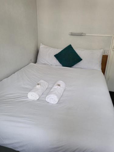 Ένα ή περισσότερα κρεβάτια σε δωμάτιο στο Tulip Hotel Blackpool